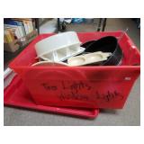 Container With Assorted Kitchen Like Items