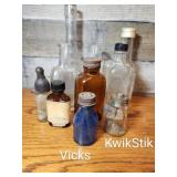Group of vintage bottles. 1 Vicks l, 1 Kwik Stik
