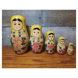 (A) Russia Nesting Dolls, hand painted.