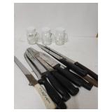 Assorted Knives And Salt And Pepper Shakers