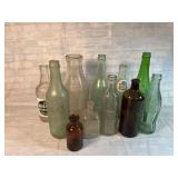 Collection of Old Bottles, Including 1921 Orange