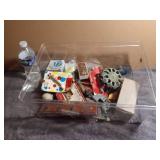 Small Plastic Tote with Various Household Items