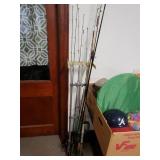 Assorted Vintage Fishing Poles And Stand