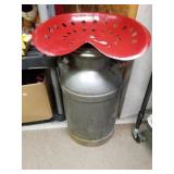 Tractor Seat On Top Of Milk Can
