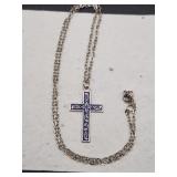 Silver metal and blue cross necklace. 18"