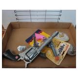 Cap Guns And Belt Buckles