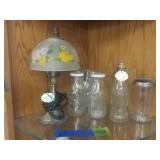 Glass Bottles And Miniature Lamp