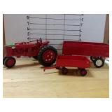 Rwd Tractor And Two Wagons