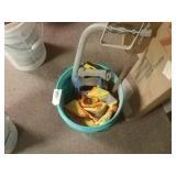 Bucket Of Saws And Safety Vest