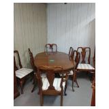 Dining Table W/ 2 Leaves, 8 Chairs And Pads