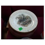 Pile Of Decorative Wildlife Plates