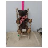 Stuffed Bear Sitting On A Chair