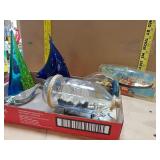 Glass Decorations And Ships In A Bottle