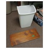 Stained Wooden Shelf And Trash Can