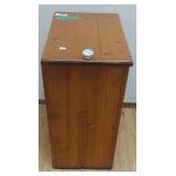 Wood Bin Light stained wood bin with hinged lid.