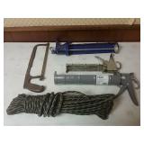 Calk Guns, Rope And Saw