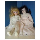 2 small porcelain dolls