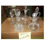 5 clear glass cruets