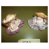 2 small dolls 2" tall