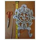 wall hanging hook, scissors and needle