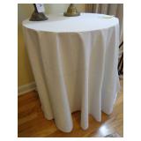 homemade table (partial board top) w/ table cloth