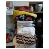 Basket w/ misc linens,
