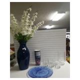 Vase With Fake Flowers, Blue Plates, Glasses,