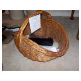 Basket with contents, sunglasses, candles