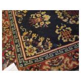 Small oriental floor rug does have some damage