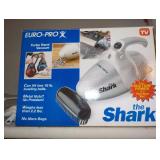 the Shark Turbo Hand Vacuum