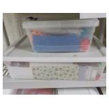 totes of gift wrapping supplies, tissue paper...