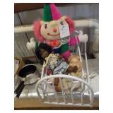 Wrought Iron small bed filled with baby dolls