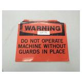 Warning do not operate machine without guards in