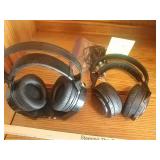 2 Sony wireless headphones w/  1 charging