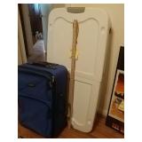 Carry on luggage and rolling under the bed tote