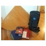 medical walking boot, Holy Bible, corner floating