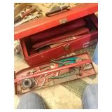 Red toolbox with tools