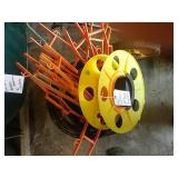 Bucket of wire and extension cord holders