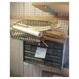 Parts bin and rack with contents. Screwed into