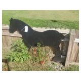 Horse silhouette and Amish buggy silhouette.