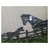 Two horse silhouette. Screwed into shed. Bring