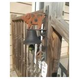 Pig Bell. Screwed into post. Bring your own tools