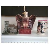 Stein, Eagle and house figurines