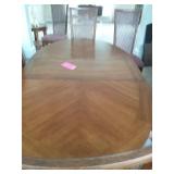 Table and six chairs     82 " x  43 " Includes