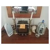 Iron, old sony tv, and decorative items