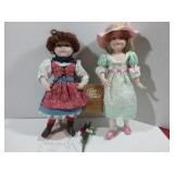 Two dolls by Franklin Heirloom   one with red