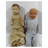 2 dolls. One only has one arm