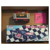 Die-cast bank with matchbox car