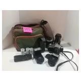 Canon AE-1 camera with accessories