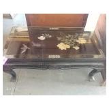 Oriental style table. Has small scratches in
